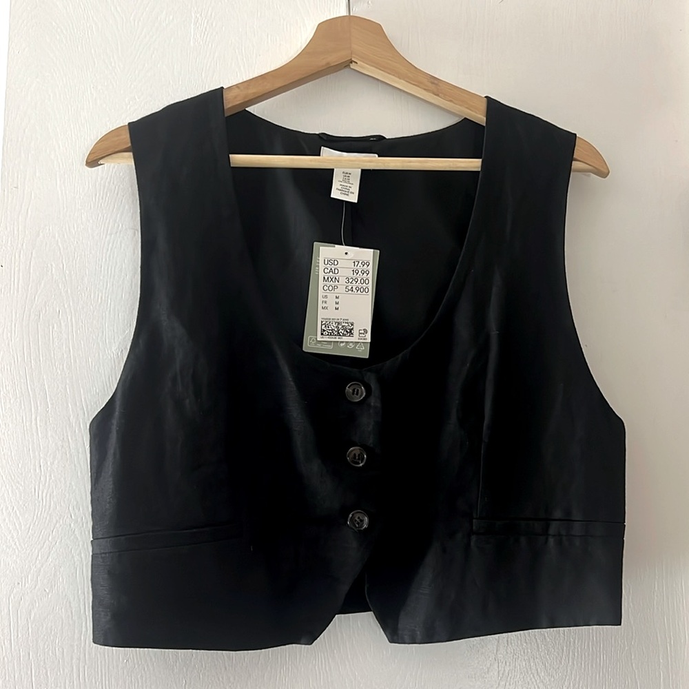 H&M black short vest. NBW